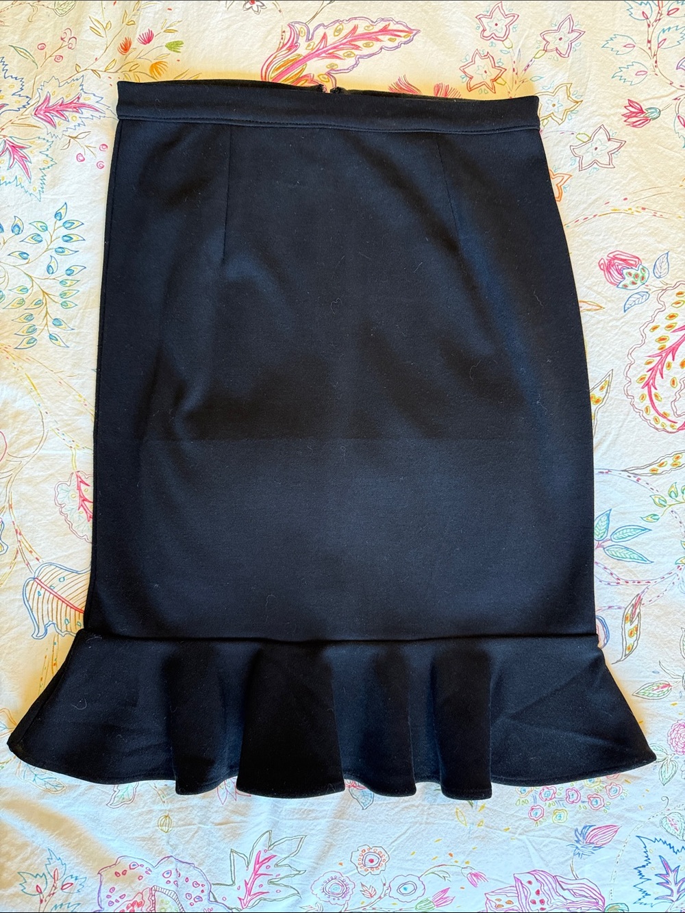 Stretch Knit Black Pencil Skirt with Ruffle Hem